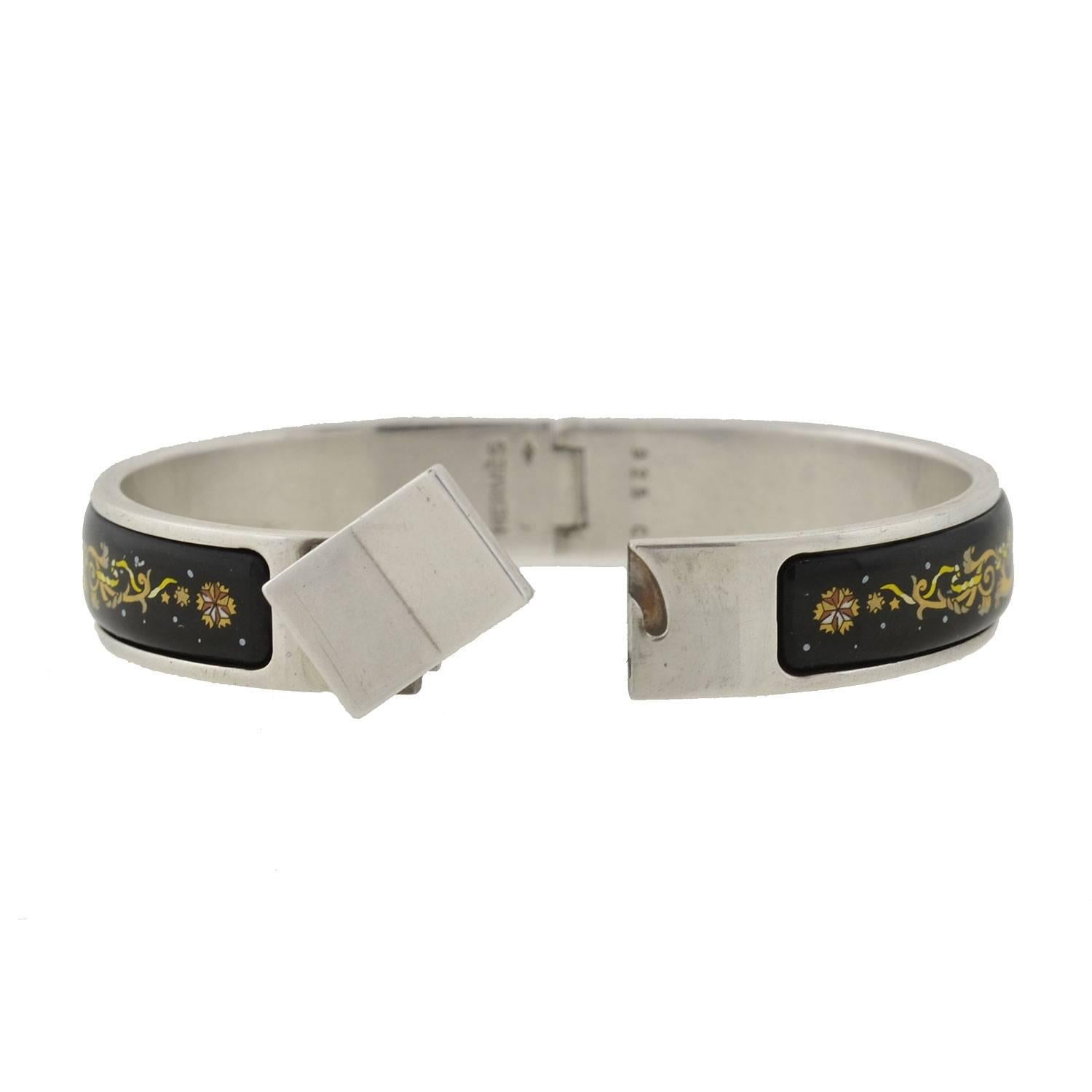 This vintage bracelet from the 1970s is a fabulous piece by legendary designer Hermes! Most of these bangles were not produced in sterling silver, which makes this piece especially desirable. The stylish bangle features an elaborate enamel surface