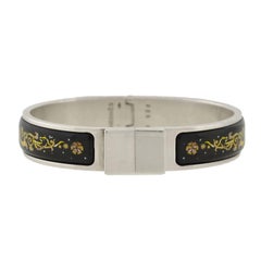 Vintage Hermes Black and Yellow Enameled Clic Clac Bracelet