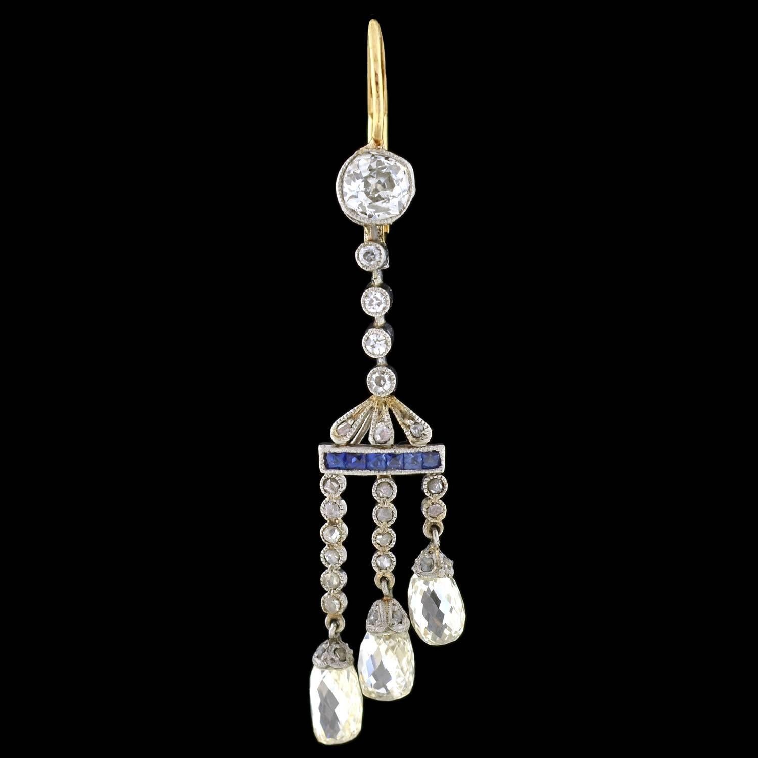 A beautiful pair of chandelier-style earrings from the Edwardian (ca1910) era! These stunning earrings are crafted in platinum, and hang from gold lever back wires (stamped 