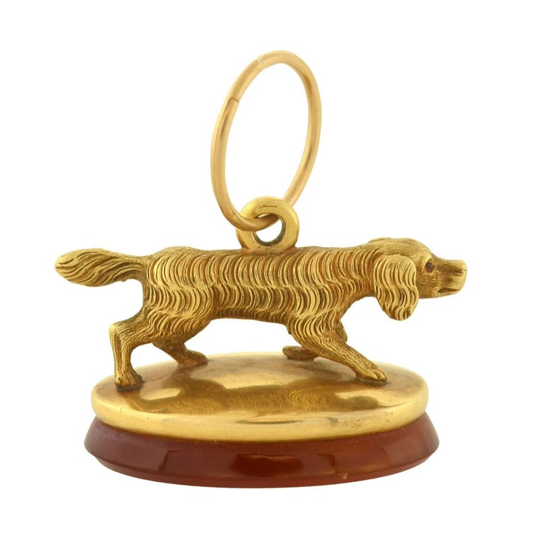 A fob is an adornment or a seal that hangs from the ribbon or chain of a pocket watch. Its purpose is to decorate or add weight to the watch chain itself making it easier for the watch to be withdrawn from a pocket. The base of the fob would often