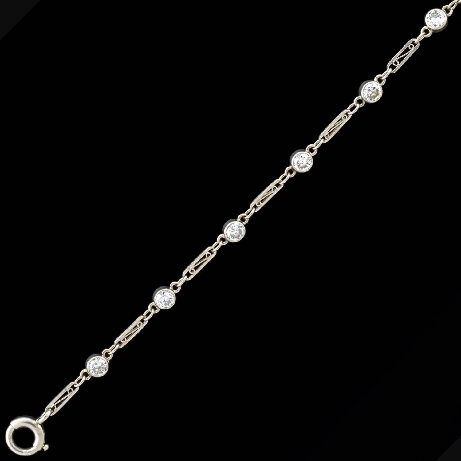 A beautiful diamond bracelet from the Art Deco (ca1920) era! Crafted in platinum, this stylish bracelet has a 