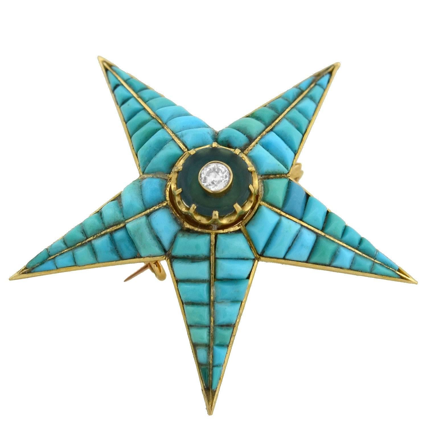 A gorgeous and unusual turquoise starburst from the Victorian (ca1880) era! This beautiful piece is crafted in vibrant 18kt yellow gold and has a convertible pin and pendant design. The stunning 5-point star design is convex in shape, and encrusted