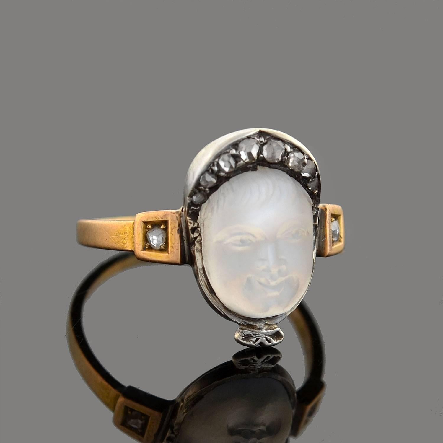A beautiful and very unusual moonstone ring from the Victorian (ca1885) era! This alluring piece is crafted in sterling silver and 18kt yellow gold and features a single moonstone cameo in the center. The moonstone is delicately hand-carved to
