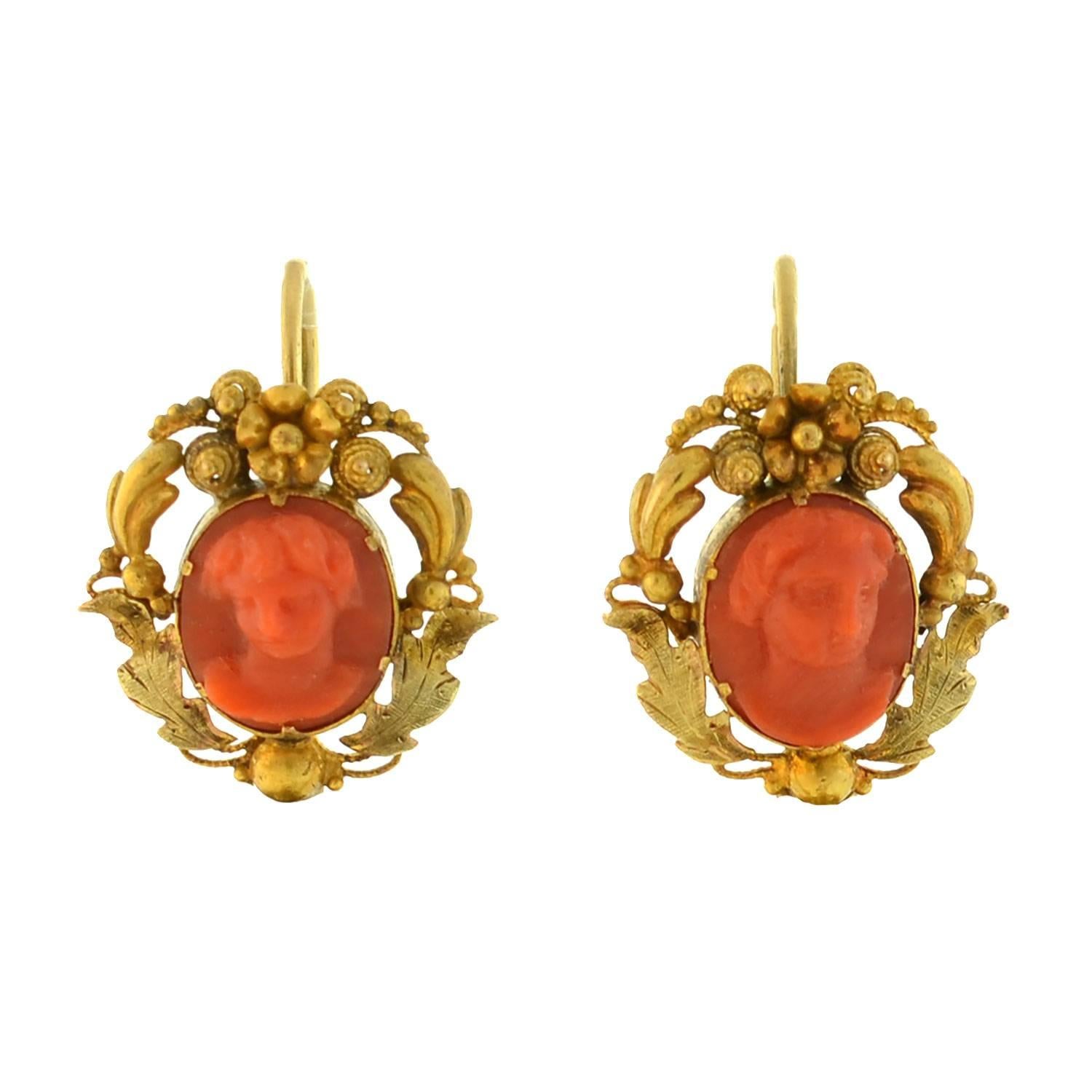 Absolutely incredible cannetille wirework and coral earrings from the early Victorian (ca1850) period! These fantastic earrings are crafted in 18kt yellow gold and are particularly large in size. With a magnificent and royal-looking appearance, each