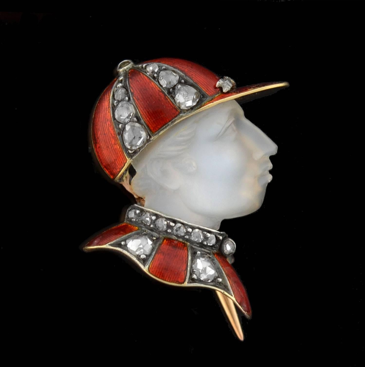 An absolutely exquisite and unusual jockey pin from the Victorian (ca1880) era! This beautifully made piece, which is French in origin, is crafted in 18kt yellow gold and has a fantastic equine-inspired design. The pin itself depicts the bust of a