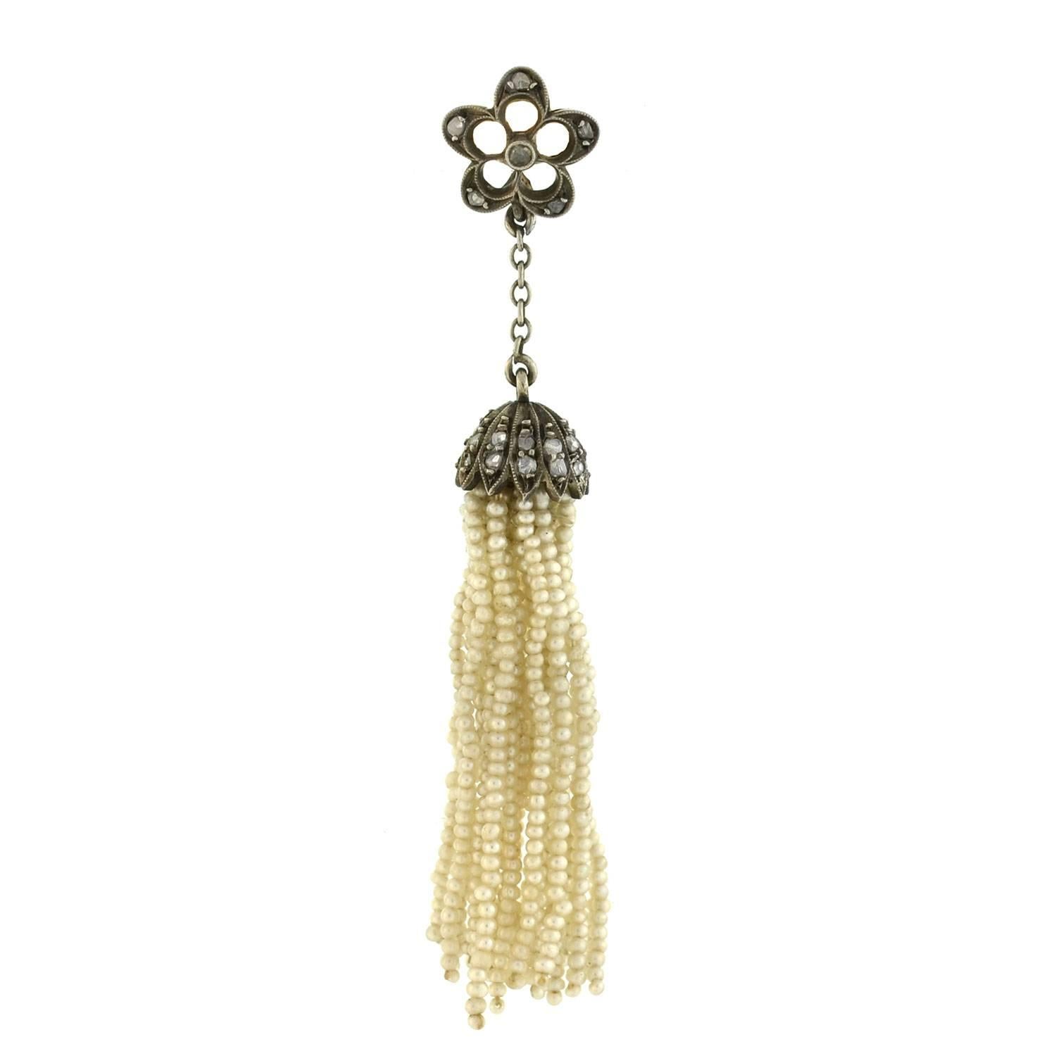 Stunning and unusual pearl earrings from the Victorian (ca1880) era! These fabulous earrings are crafted in sterling silver and 14kt yellow gold and have an interesting chandelier-like design. Each begins with a sterling topped 14kt gold open