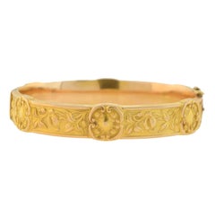 Antique Art Nouveau Gold Repousse Bangle Bracelet With Floral Motif