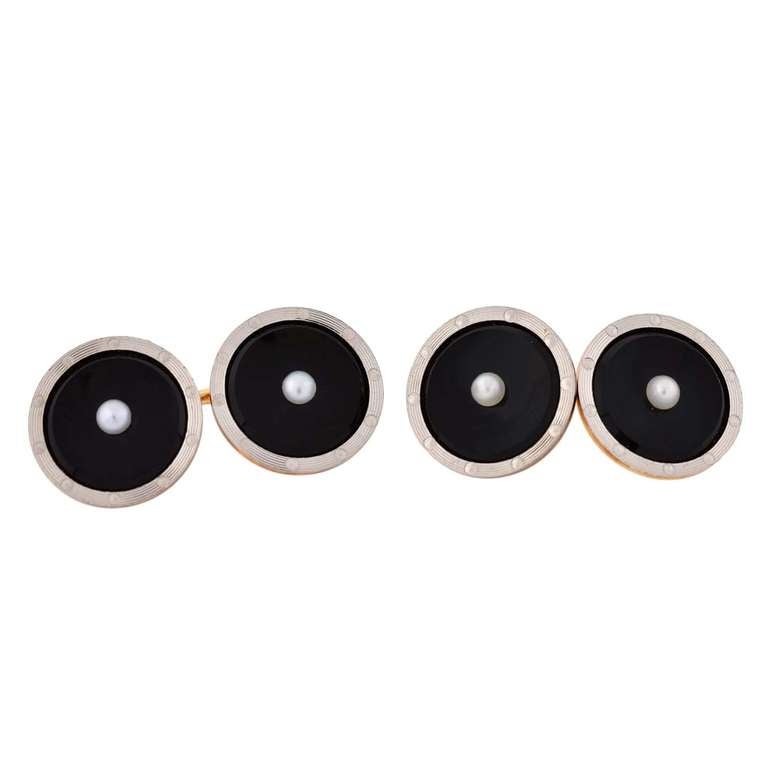 Beautiful onyx and pearl 5 piece cufflink and stud set from the Edwardian (ca1910) era! Made of 14kt yellow gold, this fabulous set is comprised of a pair of cufflinks and 7 shirt studs, a complete men's set. The cufflinks are double sided and have
