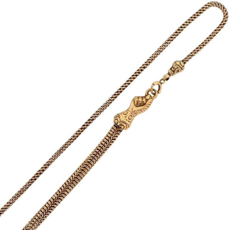 A fantastic and very unusual gold chain from the Victorian (circa 1880) era! This unique handmade piece is comprised of a wide braided link chain, which forms a flexible snake-like necklace made of 10kt yellow gold. The chain has two different