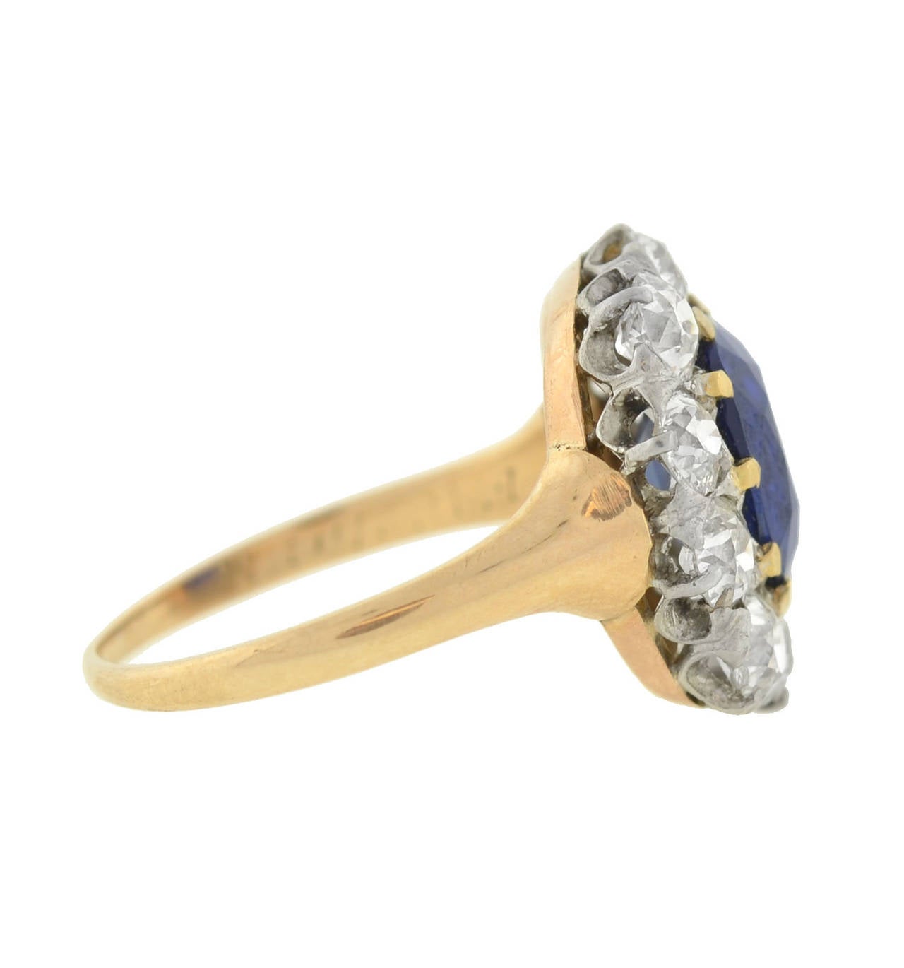 An absolutely breathtaking sapphire and diamond ring from the Edwardian (ca1910) era! Made of platinum-topped 14kt yellow gold, this stunning ring features an exquisite 2.00ct unheated sapphire in the center, which has a vivid, deep blue color.