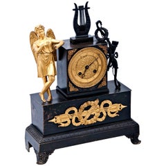 A 19th century French Empire Mantel Clock