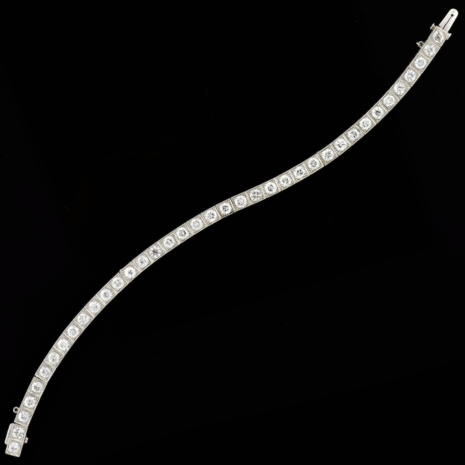 A simply stunning diamond line bracelet from the Art Deco (ca1920) era! Made of platinum, this gorgeous piece is comprised of 38 Old European Cut diamond links, which wrap around the entire length of the piece. Each sparkling diamond stone is held