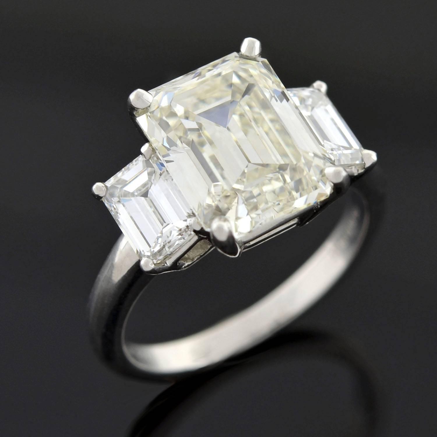 Contemporary 4.13 Carat Emerald Cut Diamond Platinum 3 Stone Engagement ...