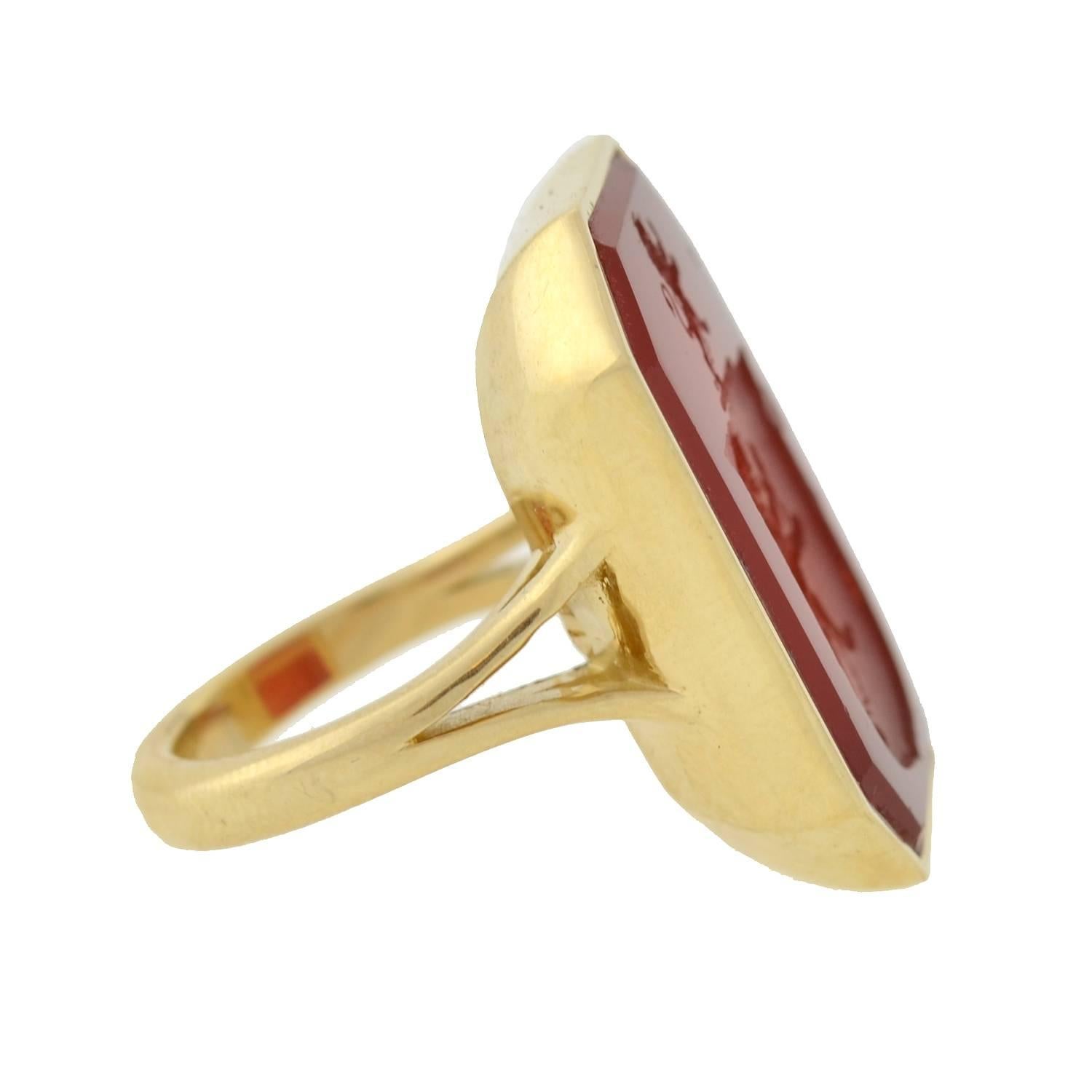 A signet ring can be represented with an intaglio, which is created by carving below the surface of a stone, or by a simple and smooth seal. Its purpose would have been to seal the wax of a letter or note.

This gorgeous signet ring is a fantastic