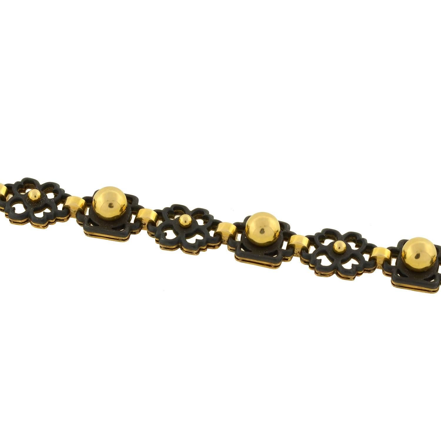 MARSH & COMPANY Floral Link Gold and Steel Bracelet 1