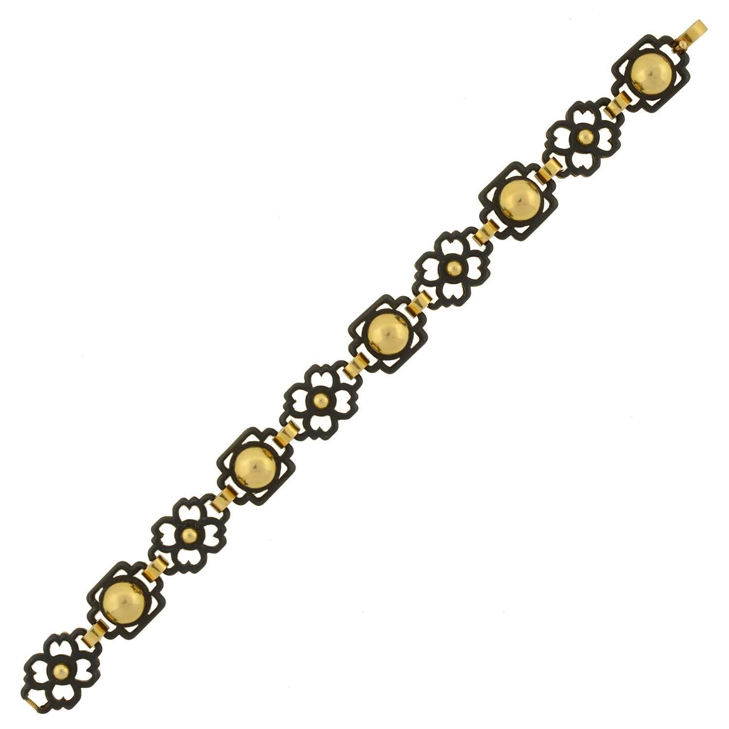 Women's MARSH & COMPANY Floral Link Gold and Steel Bracelet