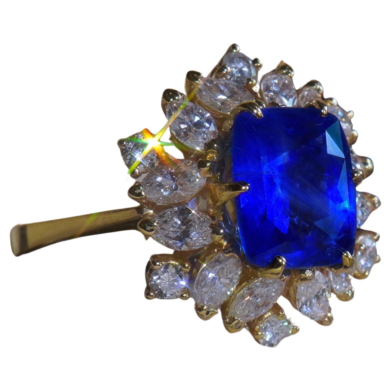 Old South Jewels proudly presents... VINTAGE LUXURY.   GIA CERTIFIED 9.19 CARAT UNHEATED BURMA SAPPHIRE 18K GOLD HUGE DIAMOND VINTAGE RING & BOX!   HUGE 6.31 CARAT BRILLIANT ROYAL BLUE GIA CERTIFIED RARE NO HEAT NATURAL SAPPHIRE.   This Gorgeous