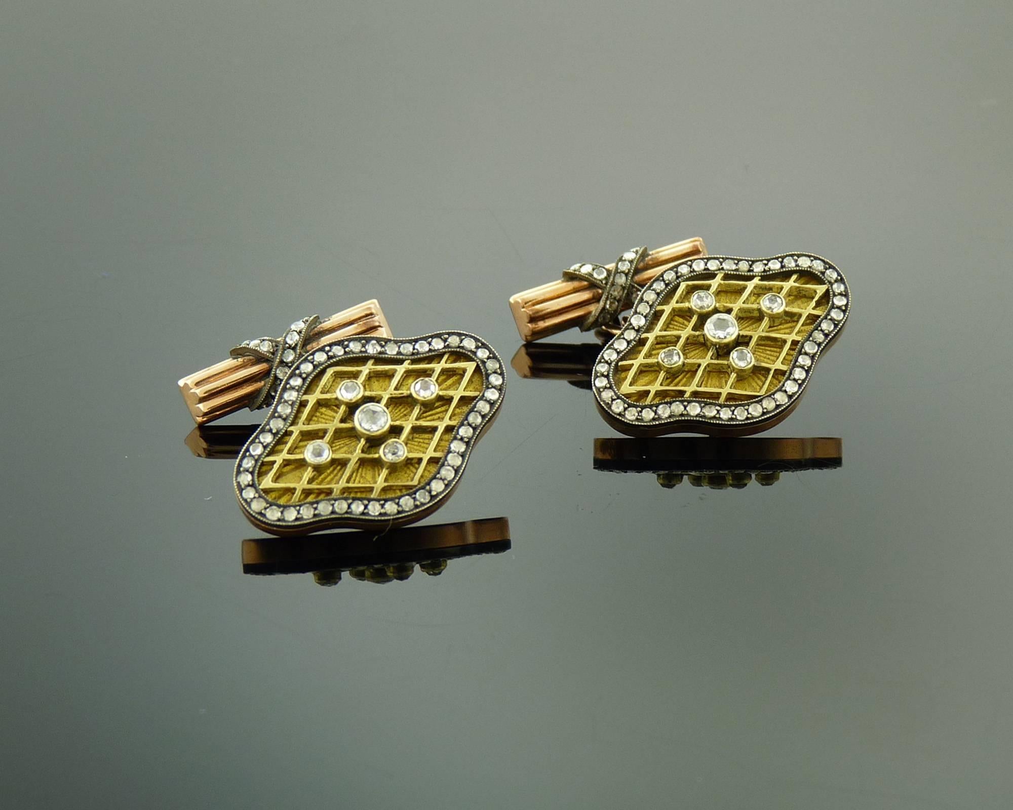Outstanding and well balanced, beautiful pair of rose-cut diamond and yellow enamel cuff-links in  Russian Imperial style.  
The design features rose-cut diamonds set in silver on top of rose gold on the yellow enamel ground.  
The total diamond