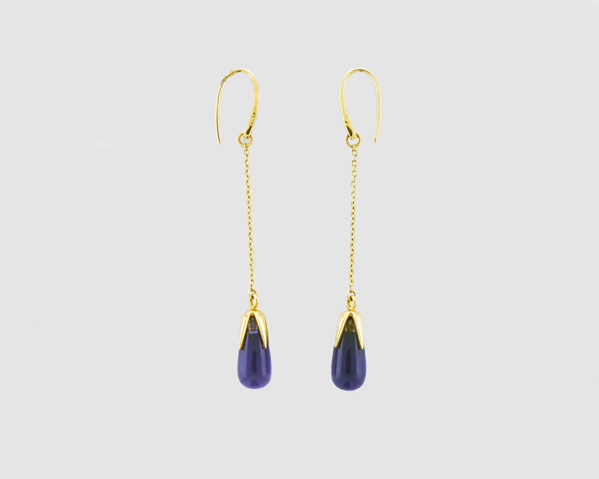 This authentic pair of earrings are by Pomellato, they are crafted from solid 18k rose gold with a polished finish featuring a dangling tear drop like shape amethyst. It is signed by the designer with the metal content.

Material: 18k rose gold