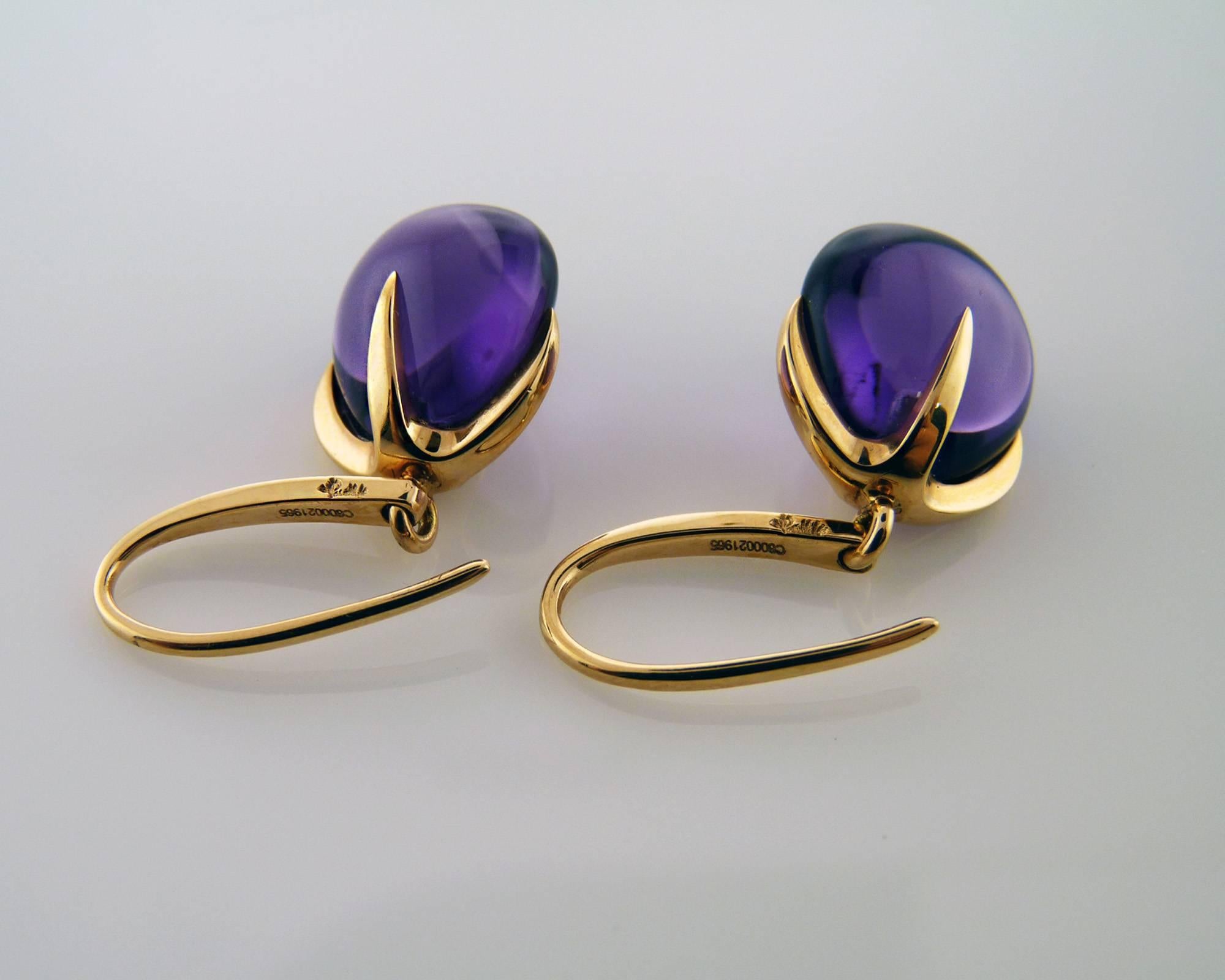 This authentic pair of earrings are by Pomellato, they are crafted from solid 18k rose gold with a polished finish featuring hook backs with a dangling fruit like shape amethyst. It is signed by the designer with the metal content.

Material: 18k