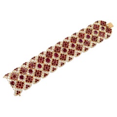 Bracciale Cartier “Mexico” con rubini e diamanti in oro 18 carati – Di seconda mano, con marchio