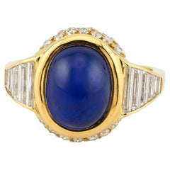 Anello con diamante e zaffiro blu cabochon da 7,50 carati in oro giallo 18 carati