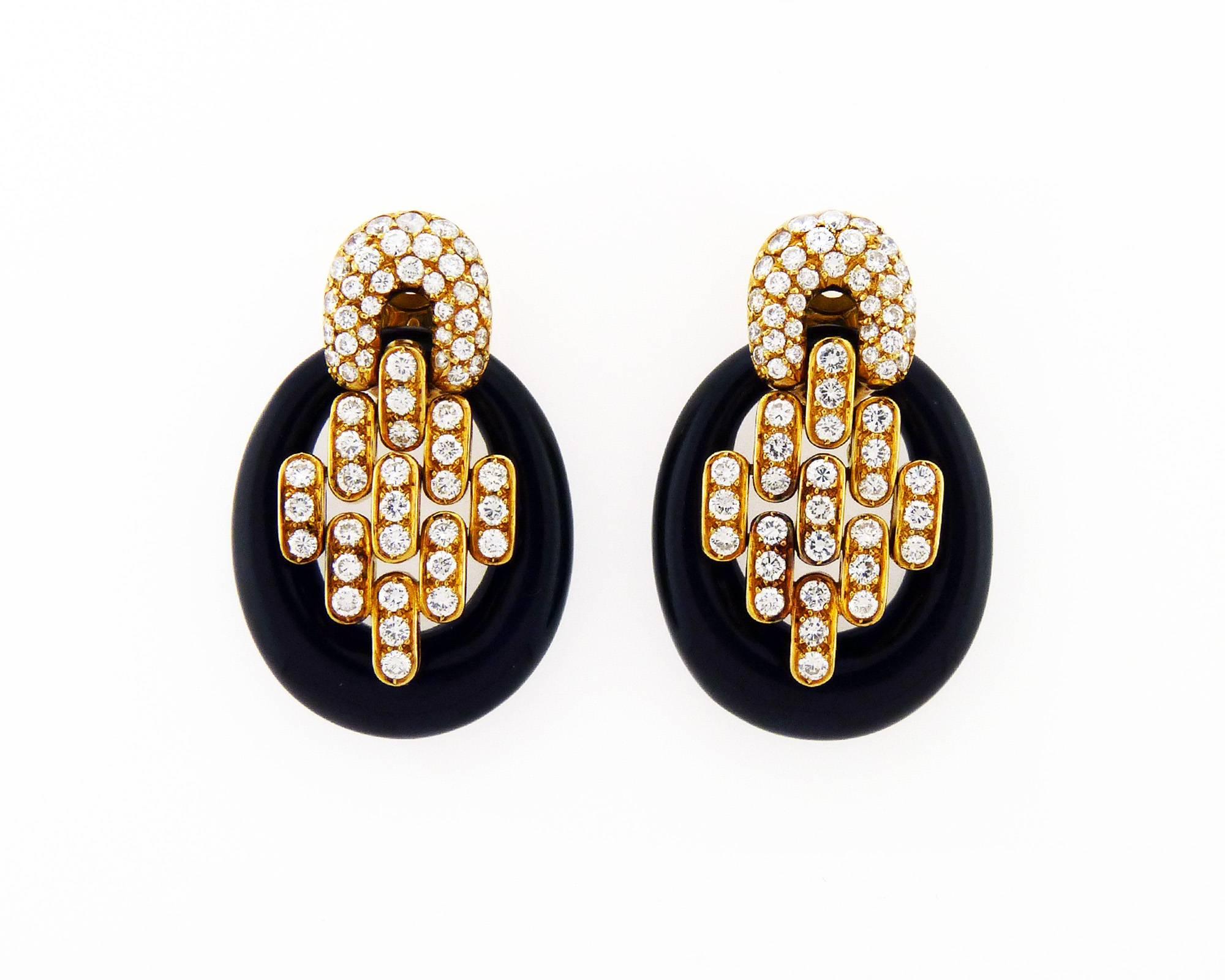 A pair of onyx and diamond earclips mounted in 18K yellow gold by Boucheron, France. This versatile earclips can be worn in two different ways: with or without the black onyx. The earrclips feel very comfortable on the ear.
Diamonds are