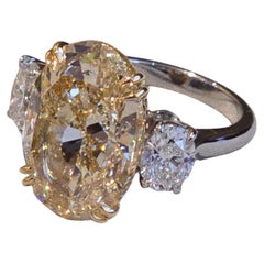 GIA 11,38ct Oval Fancy Light Yellow Diamond Anello con 3 pietre in platino 18K