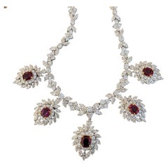 Collana vintage con rubini e diamanti in oro giallo 18 ct.