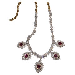 Collana vintage con rubini e diamanti in oro giallo 18 ct.