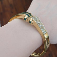 Emerald and Diamond Hinged Bangle Bracelet in 18k Yellow Gold