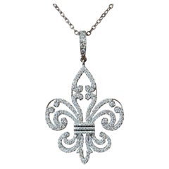 Collana con ciondolo a forma di giglio in oro bianco 18k e 14k con diamanti