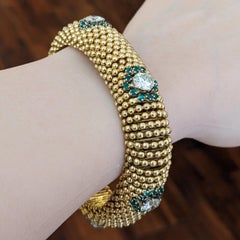 Bracciale vintage con perline a cupola con diamanti e smeraldi, in oro giallo 18 carati