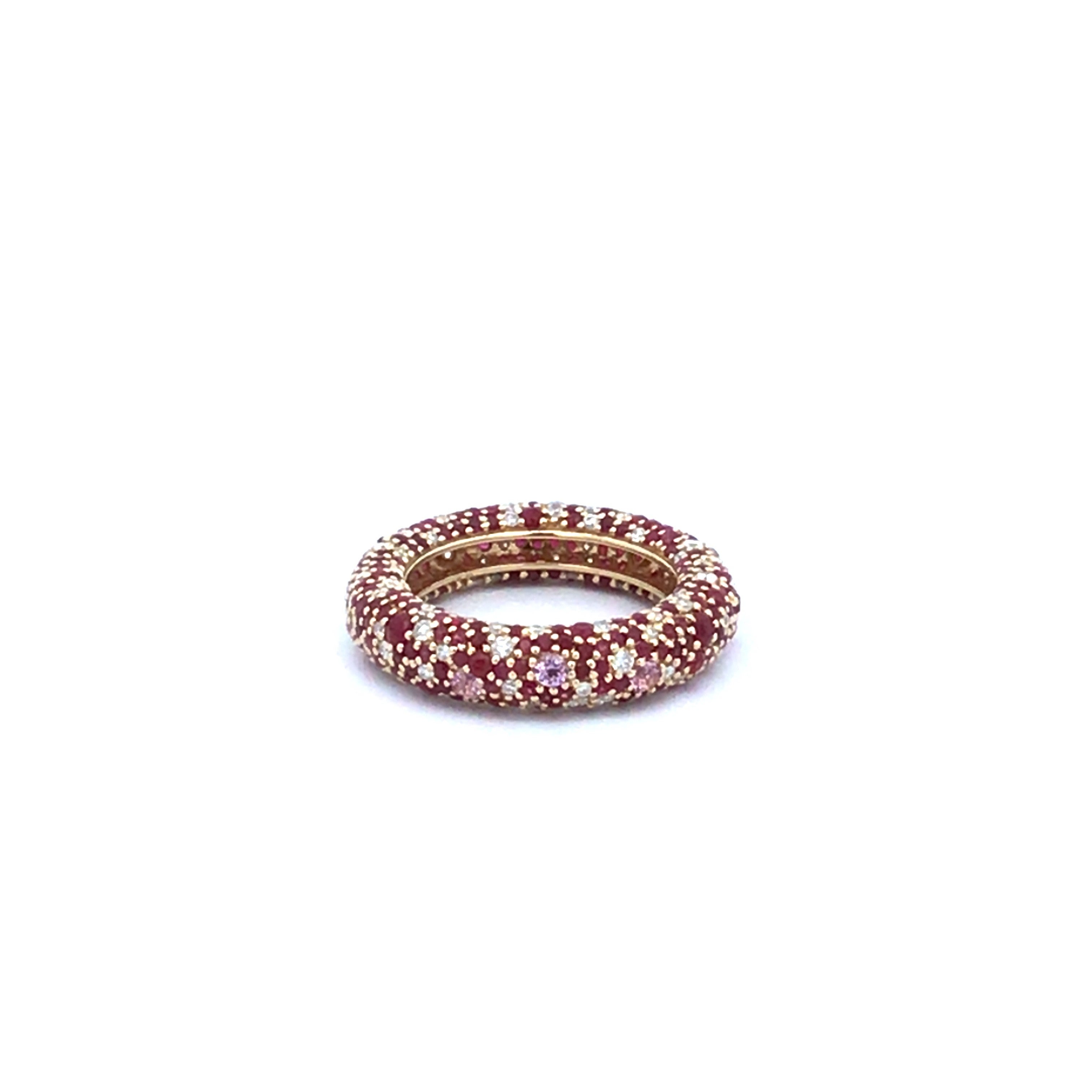 Adina Reyter Large Ruby + Pink Sapphire + Diamond Pavé Ring

This ring effortlessly adds a touch of sophistication to any ensemble! The 14k yellow gold dome band ring showcases a unique blend of hand-set pavé rubies, pink sapphires, and diamonds all