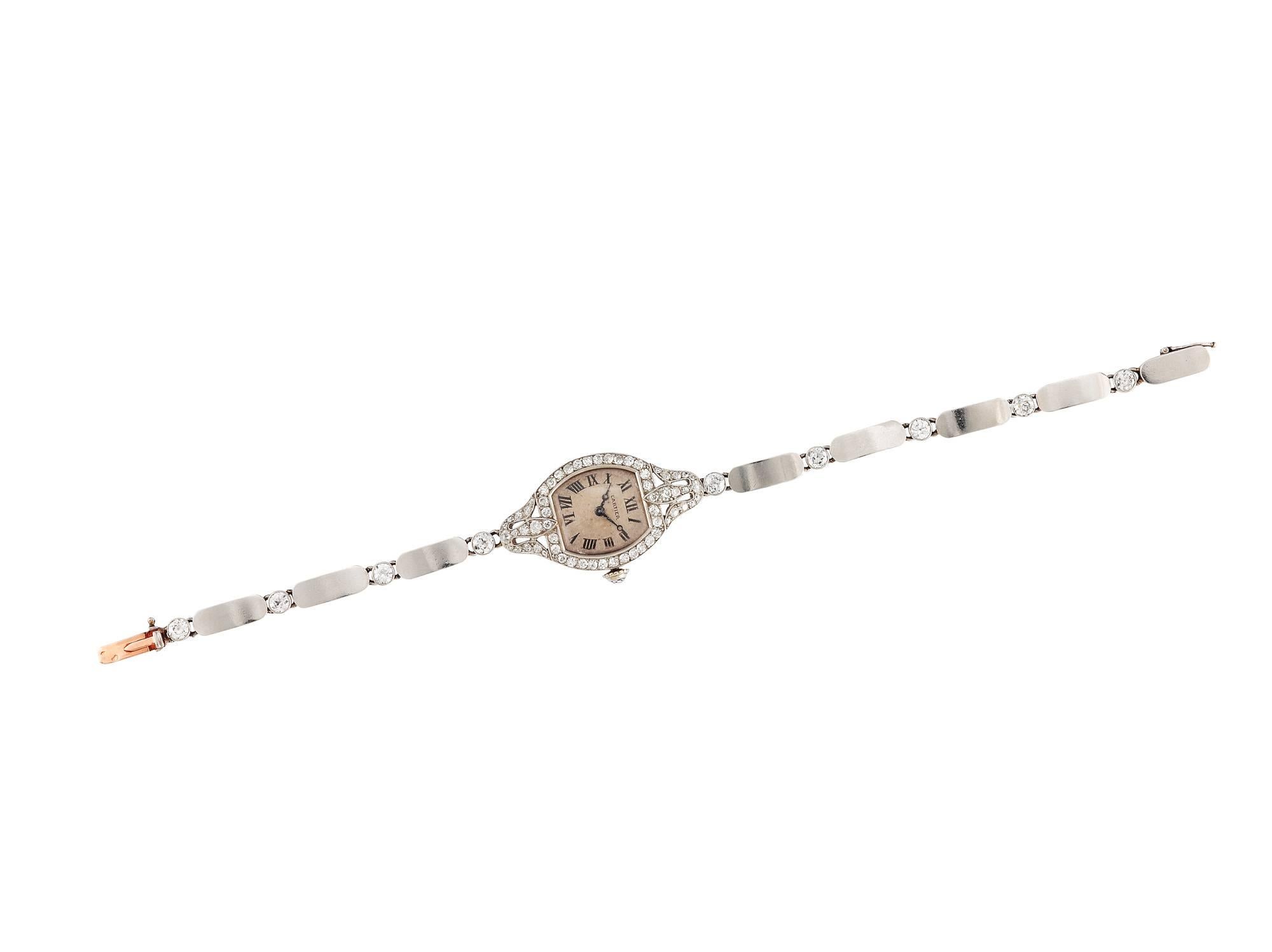 Platinum, 18K Gold, Round cut and Rose cut Diamond Bracelet Watch.
**Diamond Total Weight Approxi. 2.88 Carats.
**Hallmarks: Dog Head