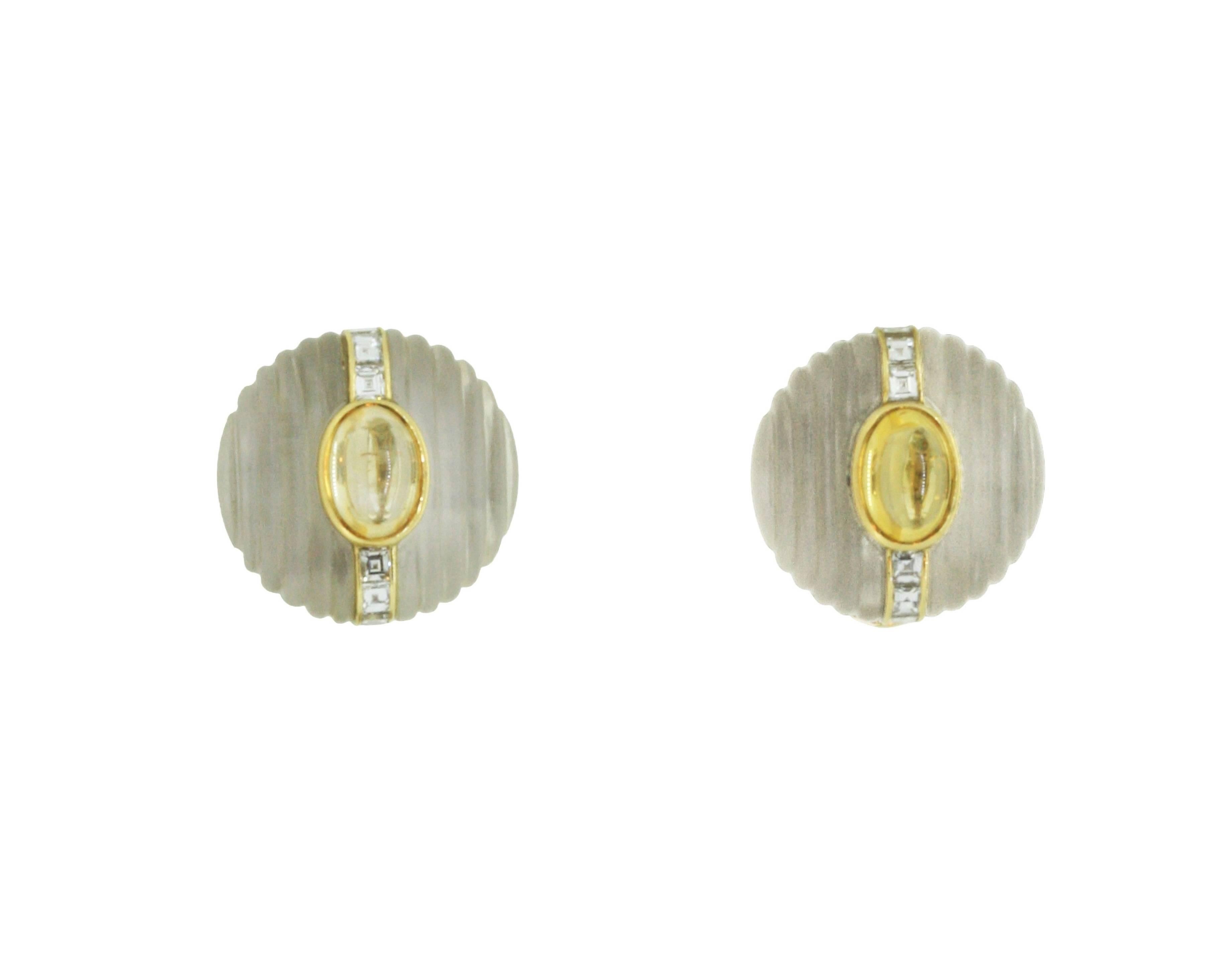 Each designed as a circular carved rock crystal base set with an oval cabochon-cut citrine, flanked by a row of square cut diamonds. Mounted in 18k gold
Signed BVLGARI