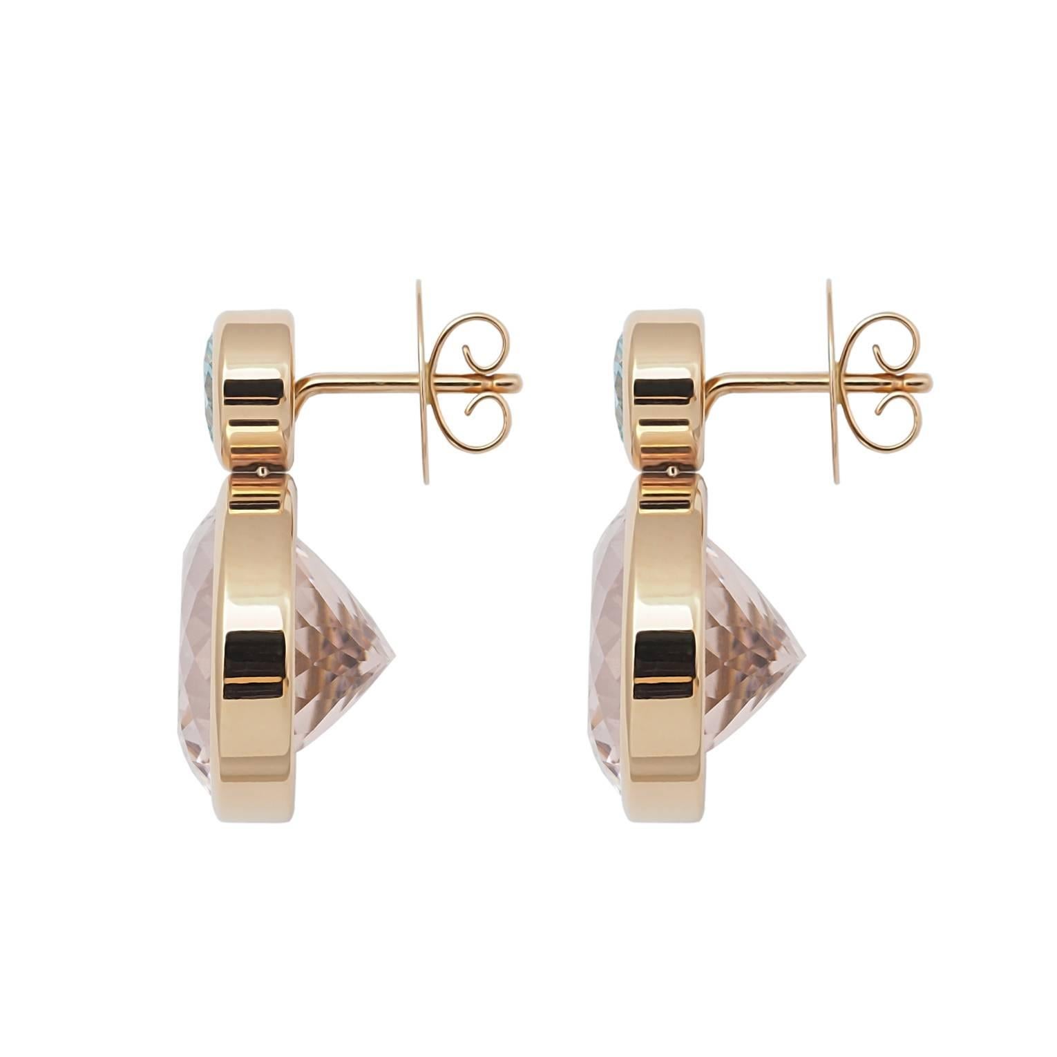 Colleen B. Rosenblat designed this classic pair of morganite (33.12 ct) and aquamarine (2.13 ct) earrings set in 18k rose gold. This earring, designed by Colleen B. Rosenblat, is perfect for daily life.