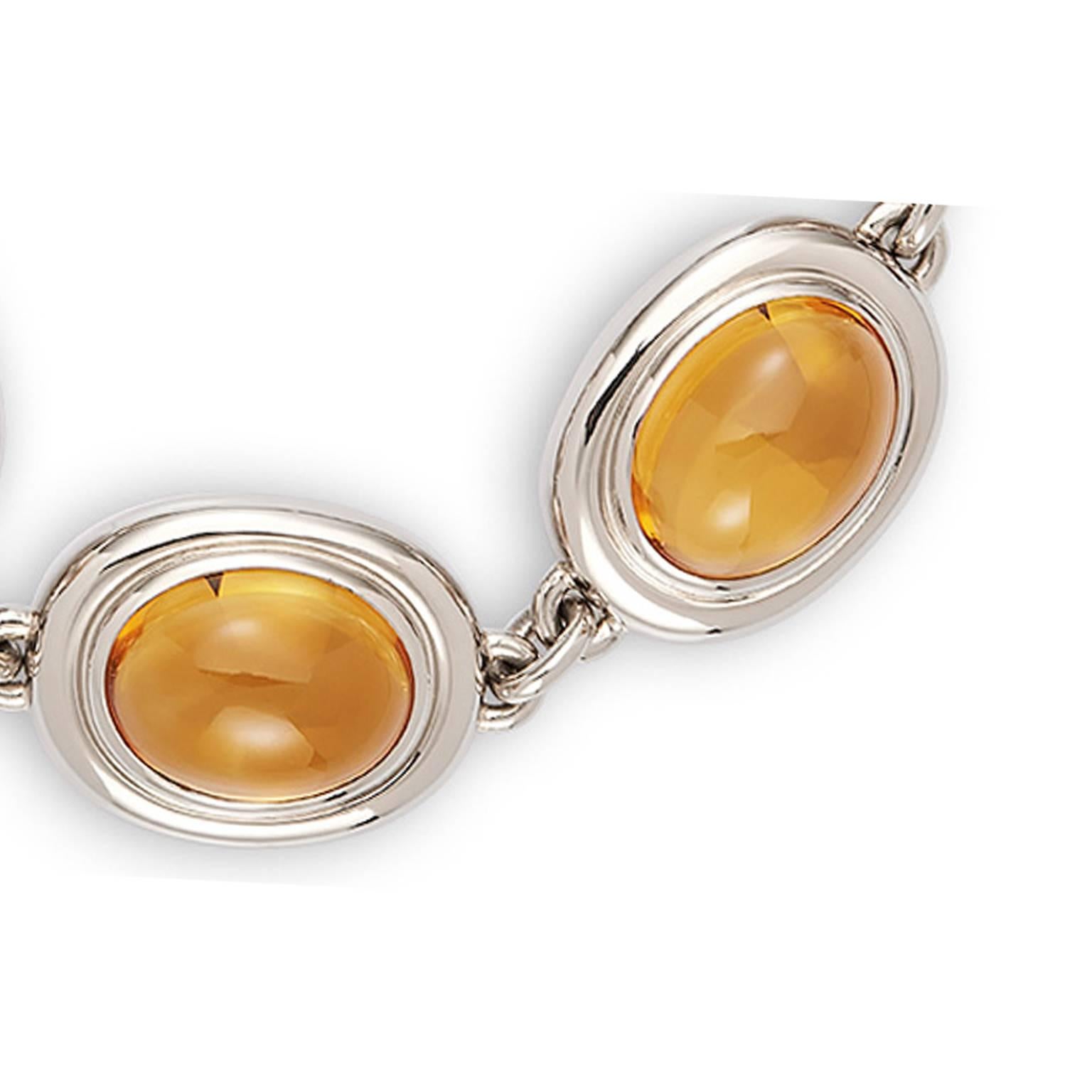 Handmade contemporary bracelet with 5 cabochon citrine 41,29 ct. set in 18K
white gold. this one of a kind piece is handmade and designed 
by Colleen B. Rosenblat