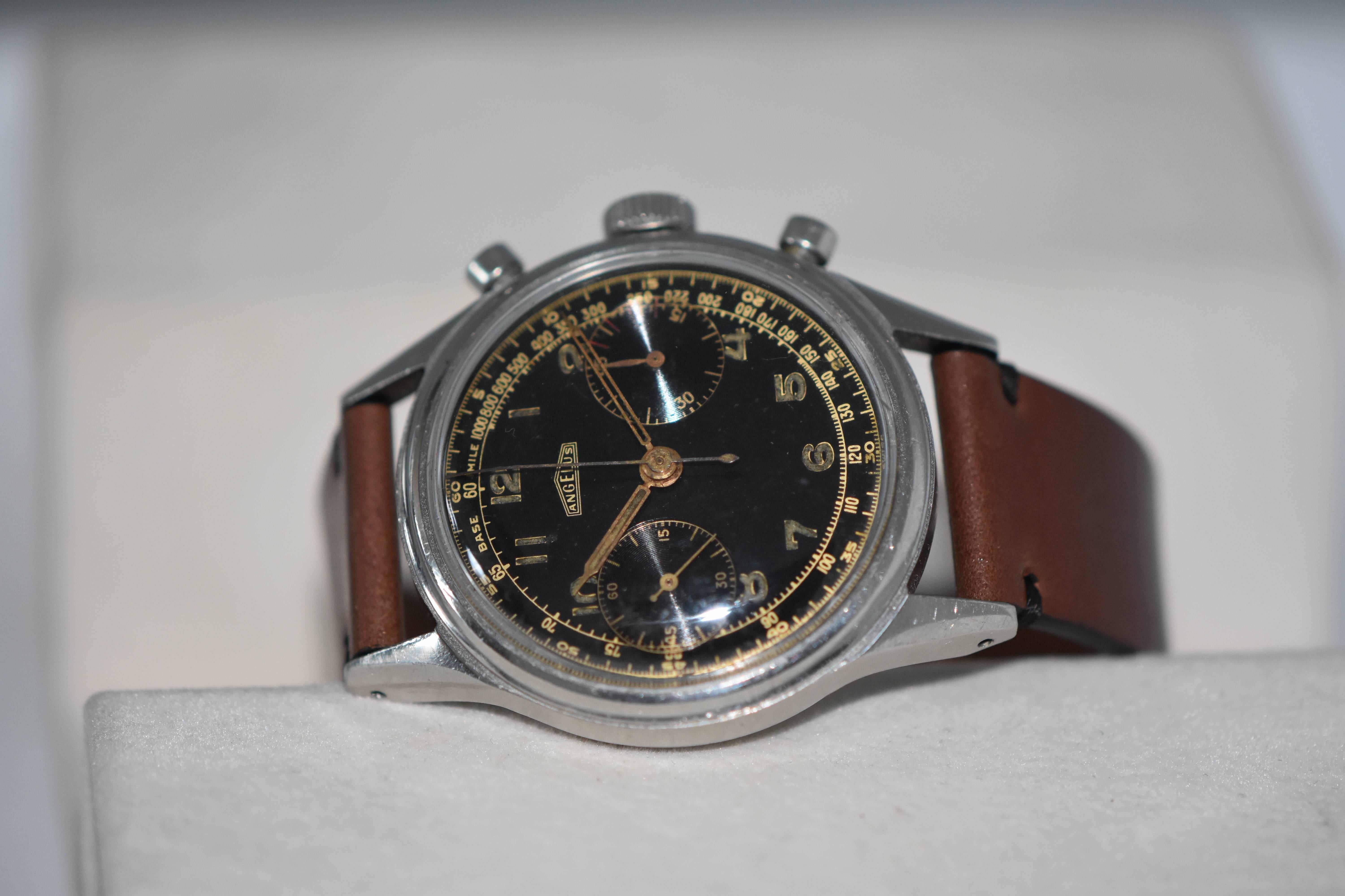 Model: Angelus Caliber 215 Chronograph

Circa: 1950 

Movement: Angelus Caliber 215

Case: Stainless steel 37mm diameter, 13mm thick, with screw down case back. Case and crystal show some minor signs of wear, understandable for its age.