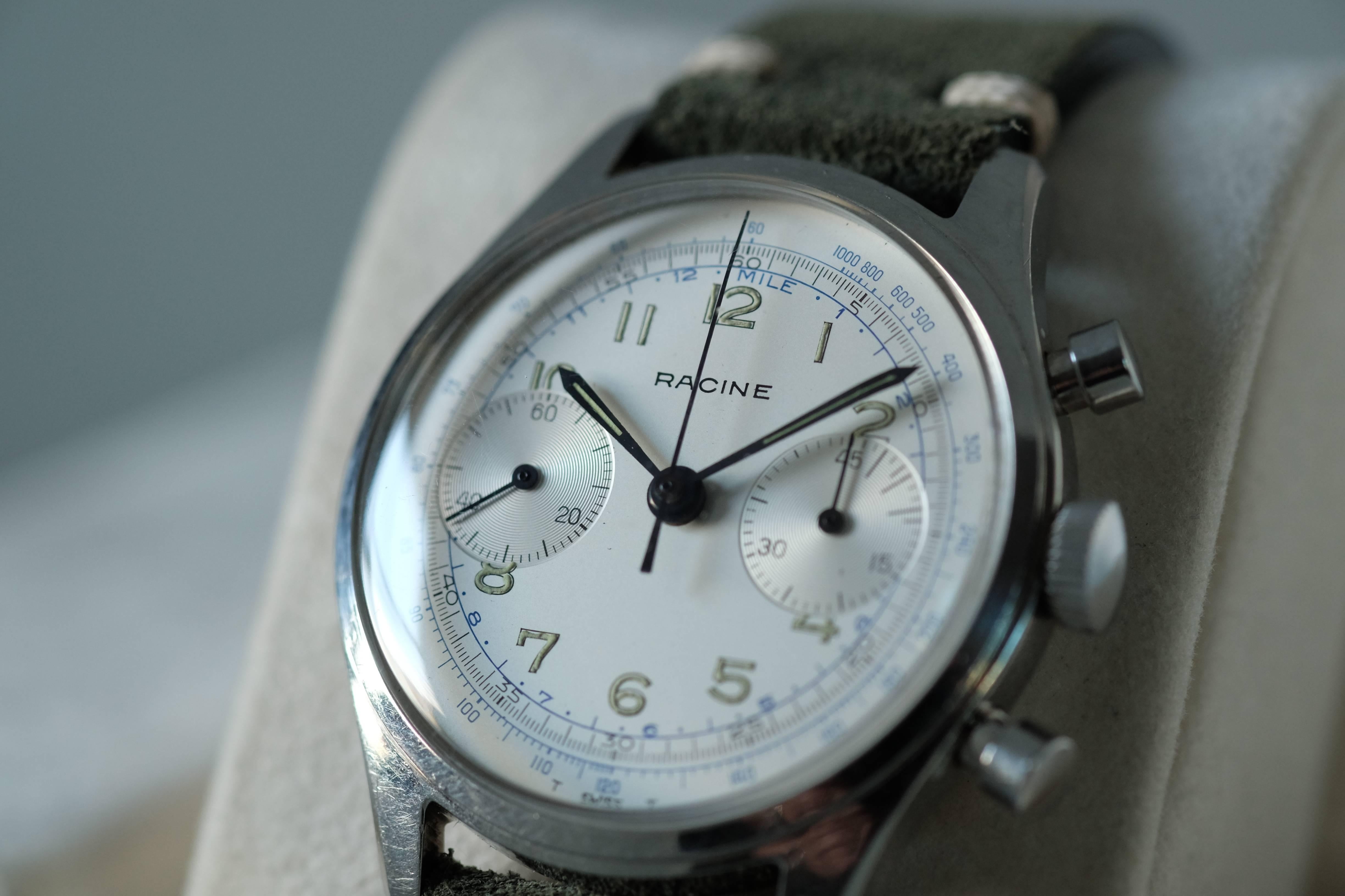 Movement: Manual-wind Gallet 17j movement

Case: Stainless steel 37mm, with chronograph pushers at 2 and 4 o'clock. Screw down case back.

Dial: White dial with hour indices in luminous Arabic numerals; tachometer and telemeter scales in blue;