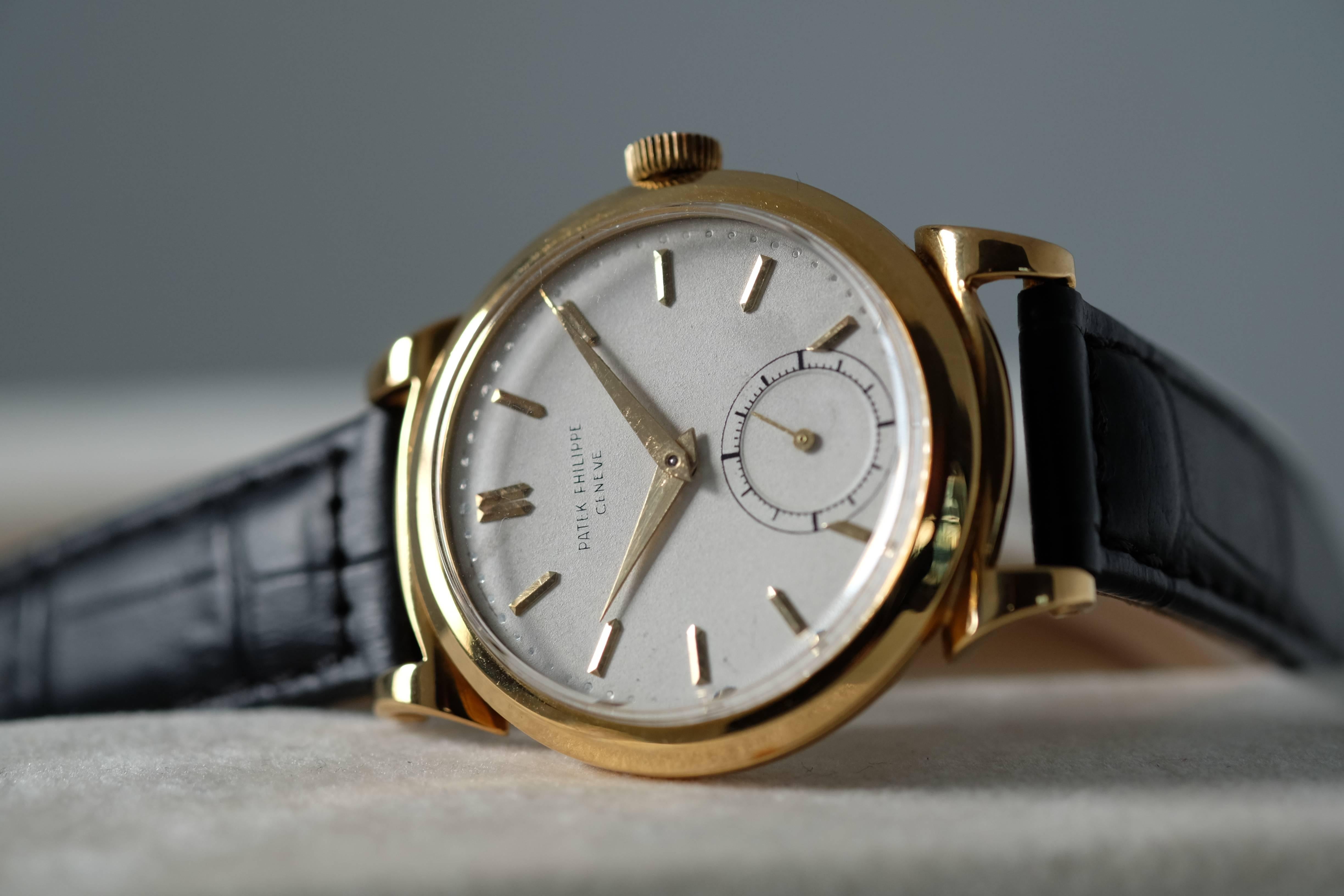 An 18k Yellow Gold Manual-Wind Patek Philippe Dress Watch with Scroll Lugs

Reference: 1491

Circa: 1940s

Movement: Manual-wind Patek Philippe Cal. 12120 movement

Case: 34mm 18k yellow gold with push-down crown and snap-on case back