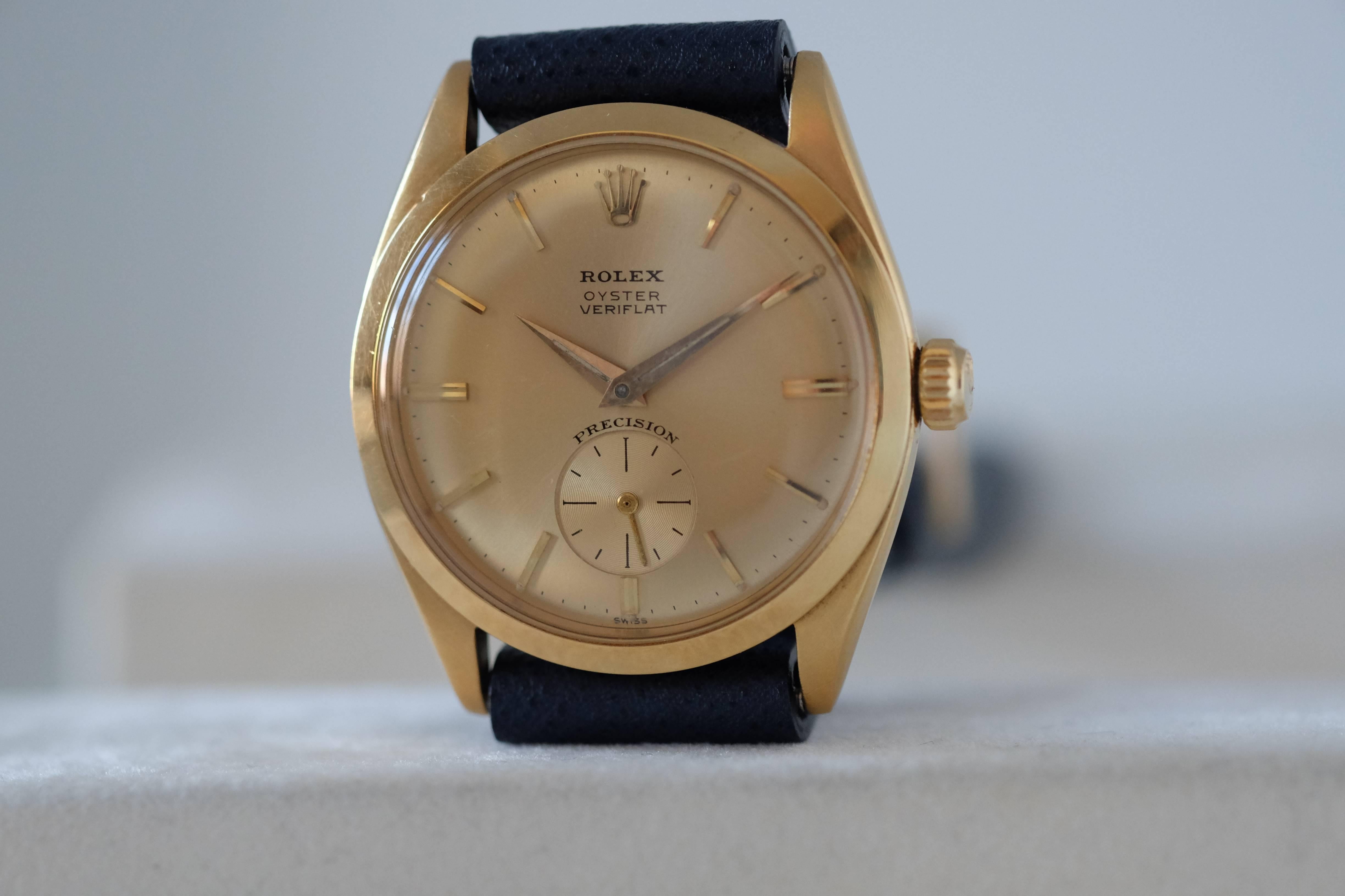 A very rare thin 18k gold Rolex dress watch  

Reference: 6512

Circa: 1950s

Movement: Manual-wind Cal. 1000. Watch is within acceptable COSC timing range

Case: 18k yellow gold, 34mm, with screw-down case back and crown. Case is untouched