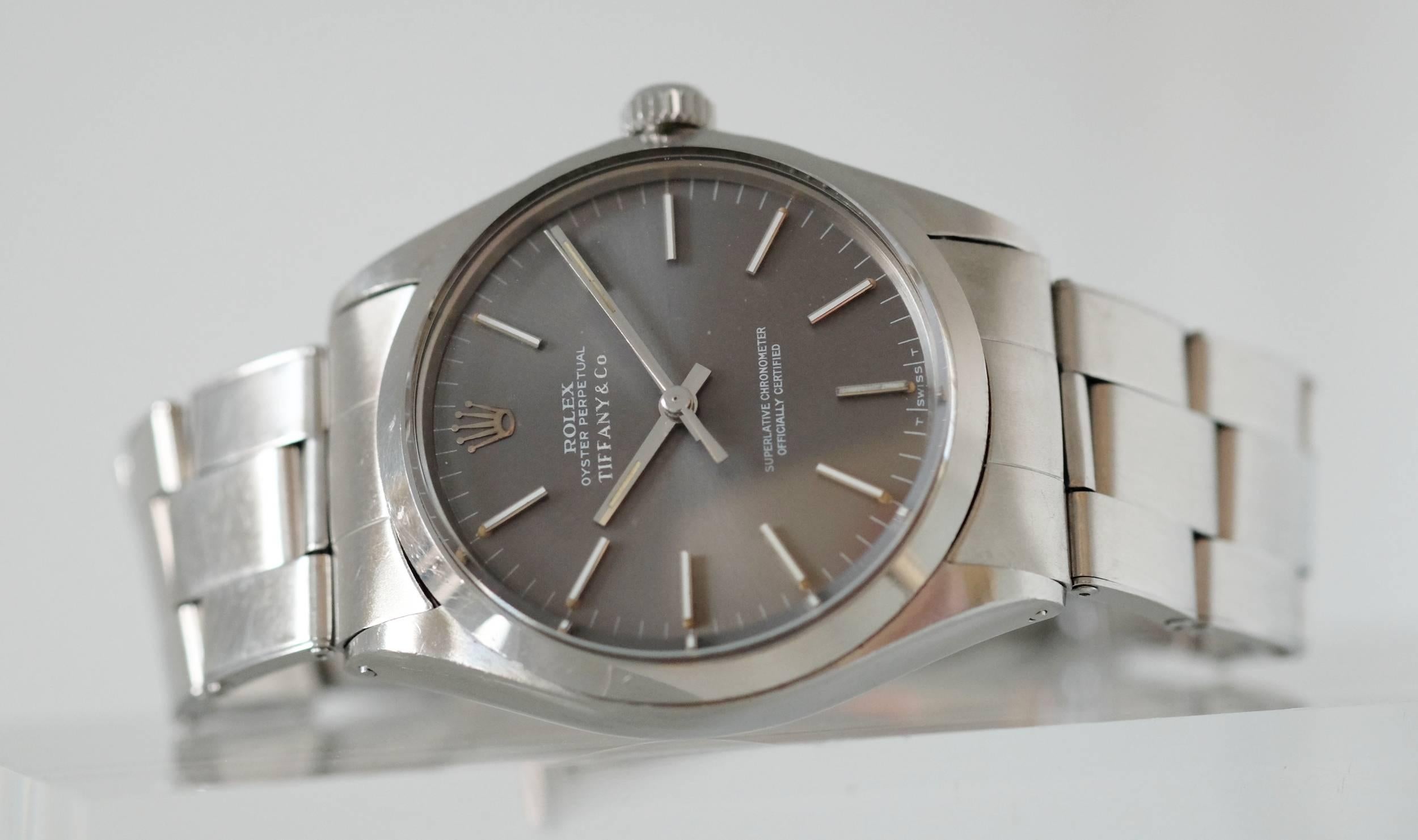 This watch has its original grey dial with perfectly preserved Tiffany Signature from the early 1970's. It is fitted with its original rivet bracelet. This is from a period when Tiffany was  supplying Rolex watches to the New York  clientele such as