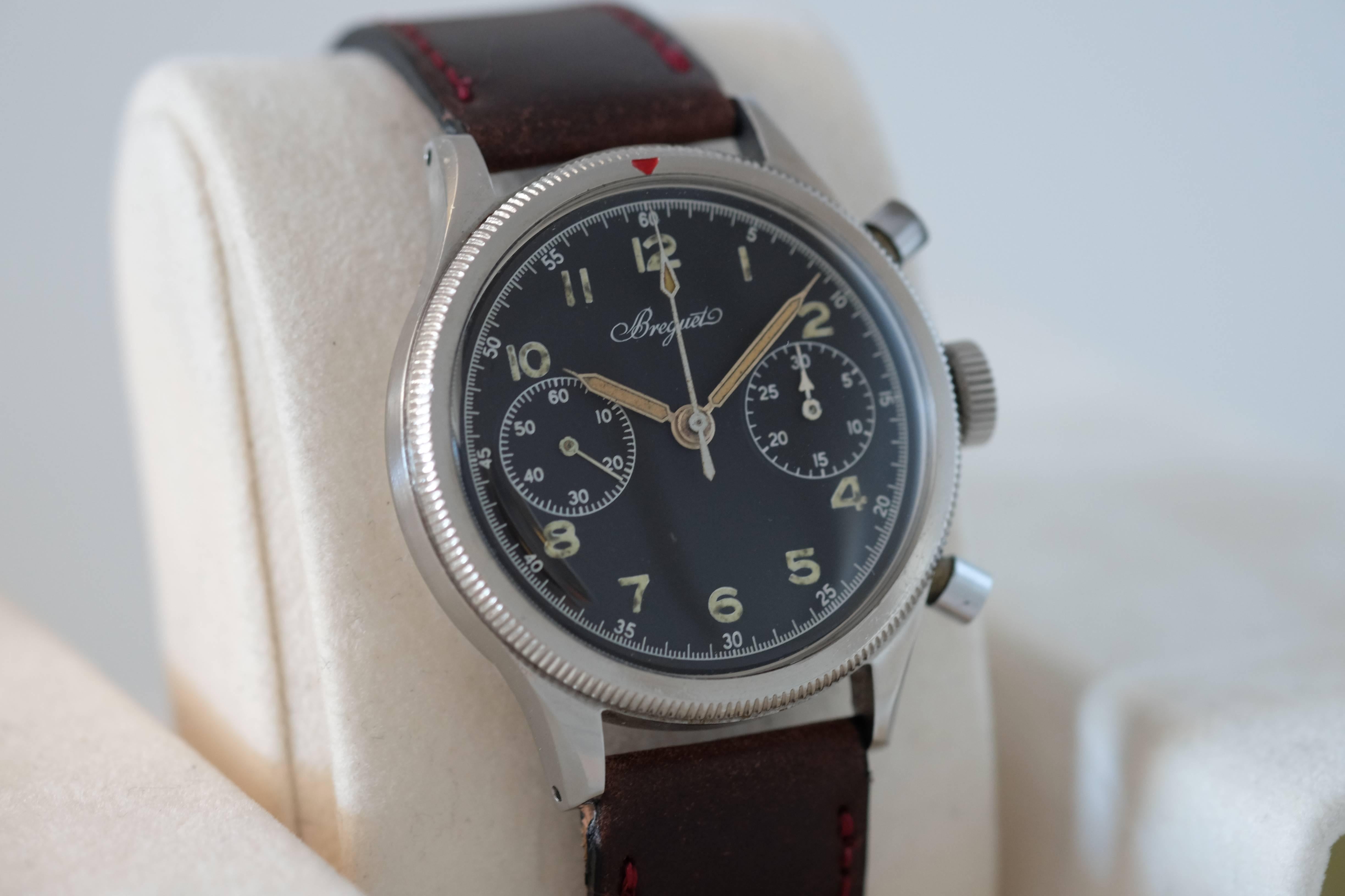 Breguet. A Rare and Early Stainless Steel Chronograph Wristwatch Issued by the French Military

Model: Type 20

Circa: 1954

Valjoux Cal. 222 mechanical movement, 17 jewels, black matte dial, luminous Arabic numerals, outer minute divisions