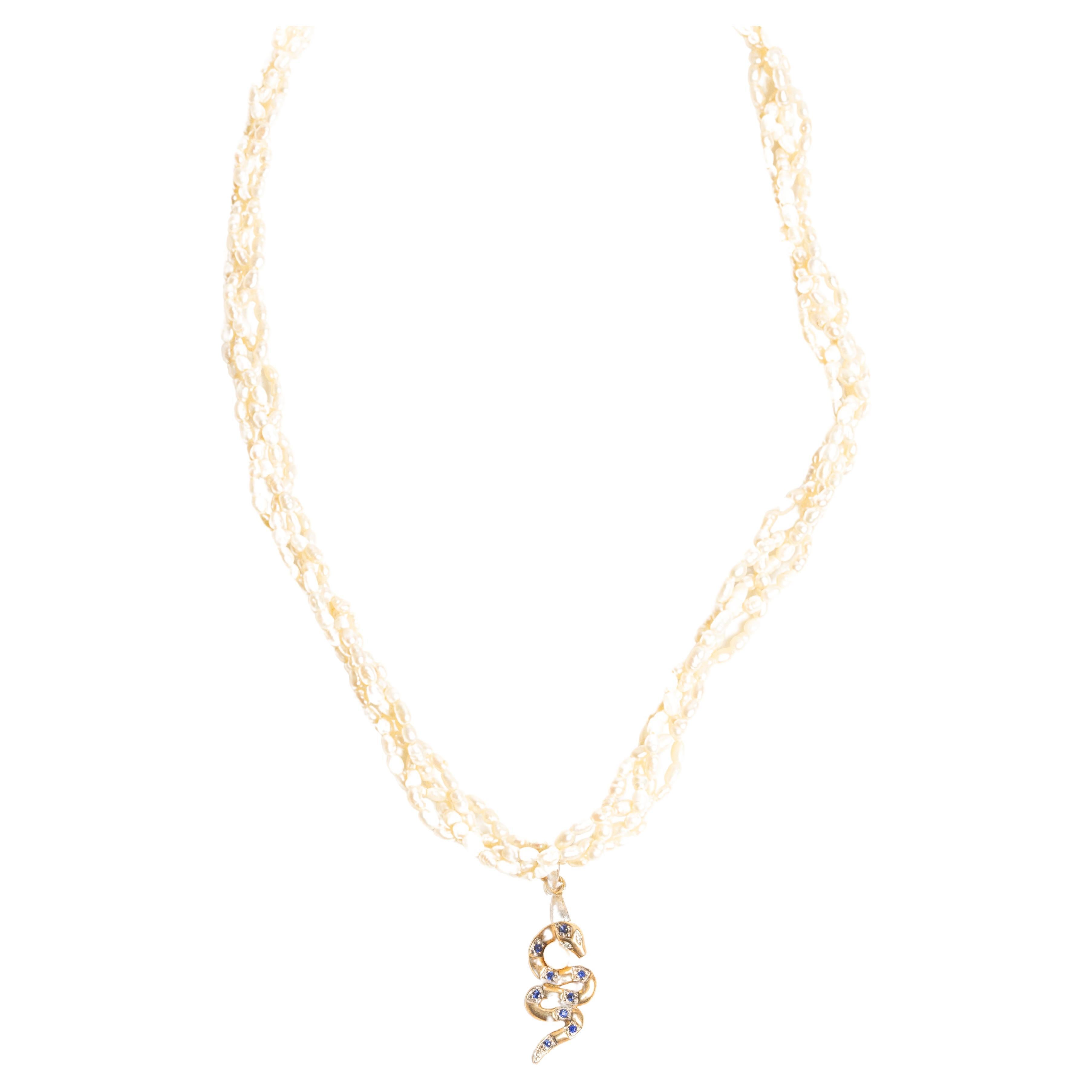 A 9ct Gold Sapphire and Diamond Snake Pearl Necklace For Sale