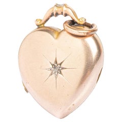 Antiguo medallón victoriano de oro de 9 ct con diamantes por delante y por detrás