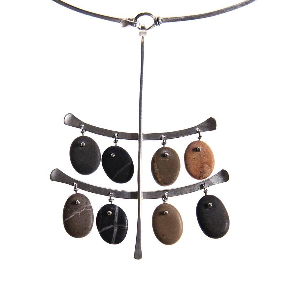 
Choker and Pendant, sterling silver and Mediterranean pebble.  
Designed by Vivianna Torun Bülow-Hübe in Biot, France. French period (late 1950s early 1960s)

French silver crab hallmark and artist’s French stamp (rhombus)
Unique additional