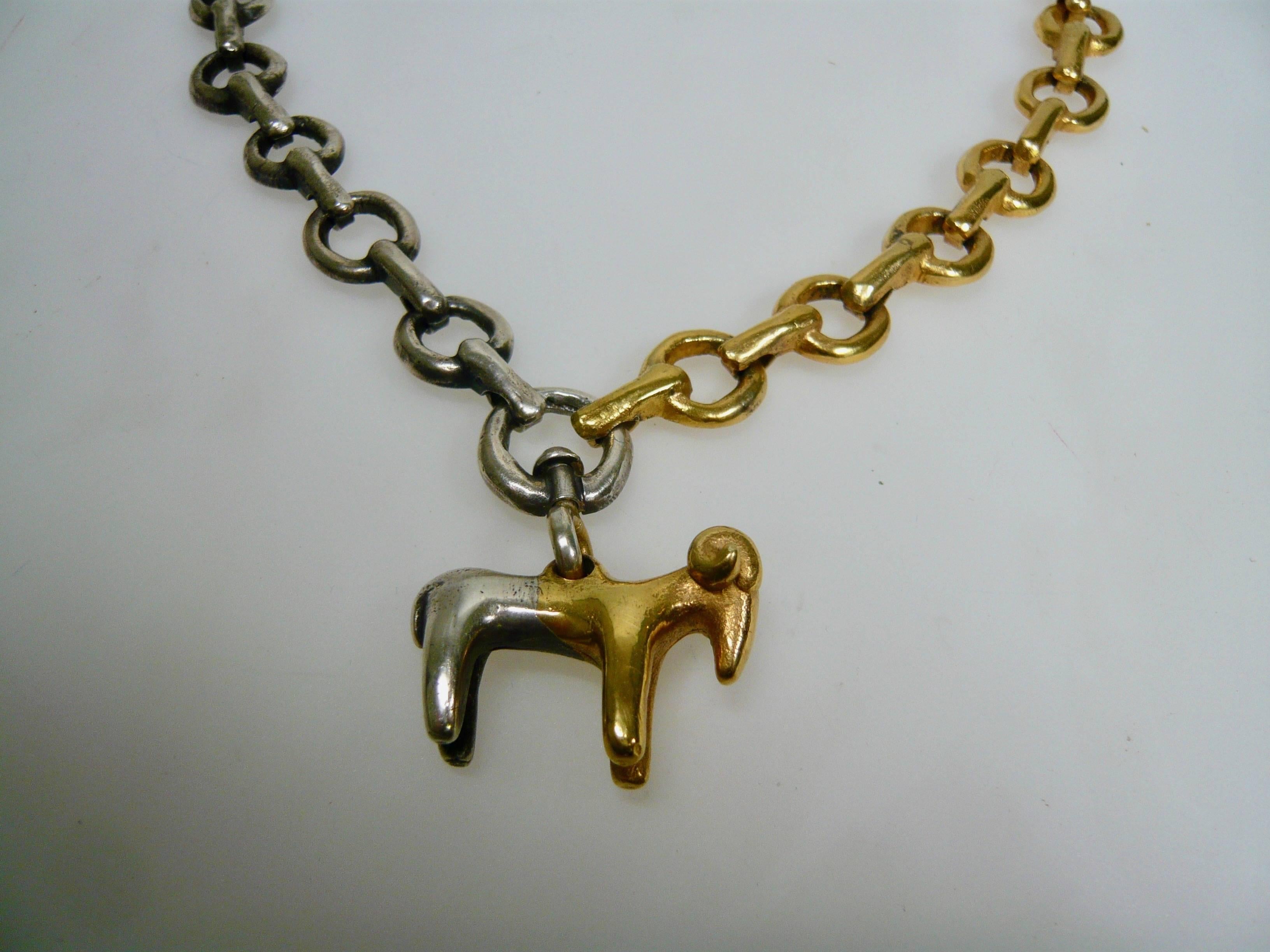 Silver and gold plated bronze necklace designed by French artist Line Vautrin
Signed with impressed signature LV
ca 1950