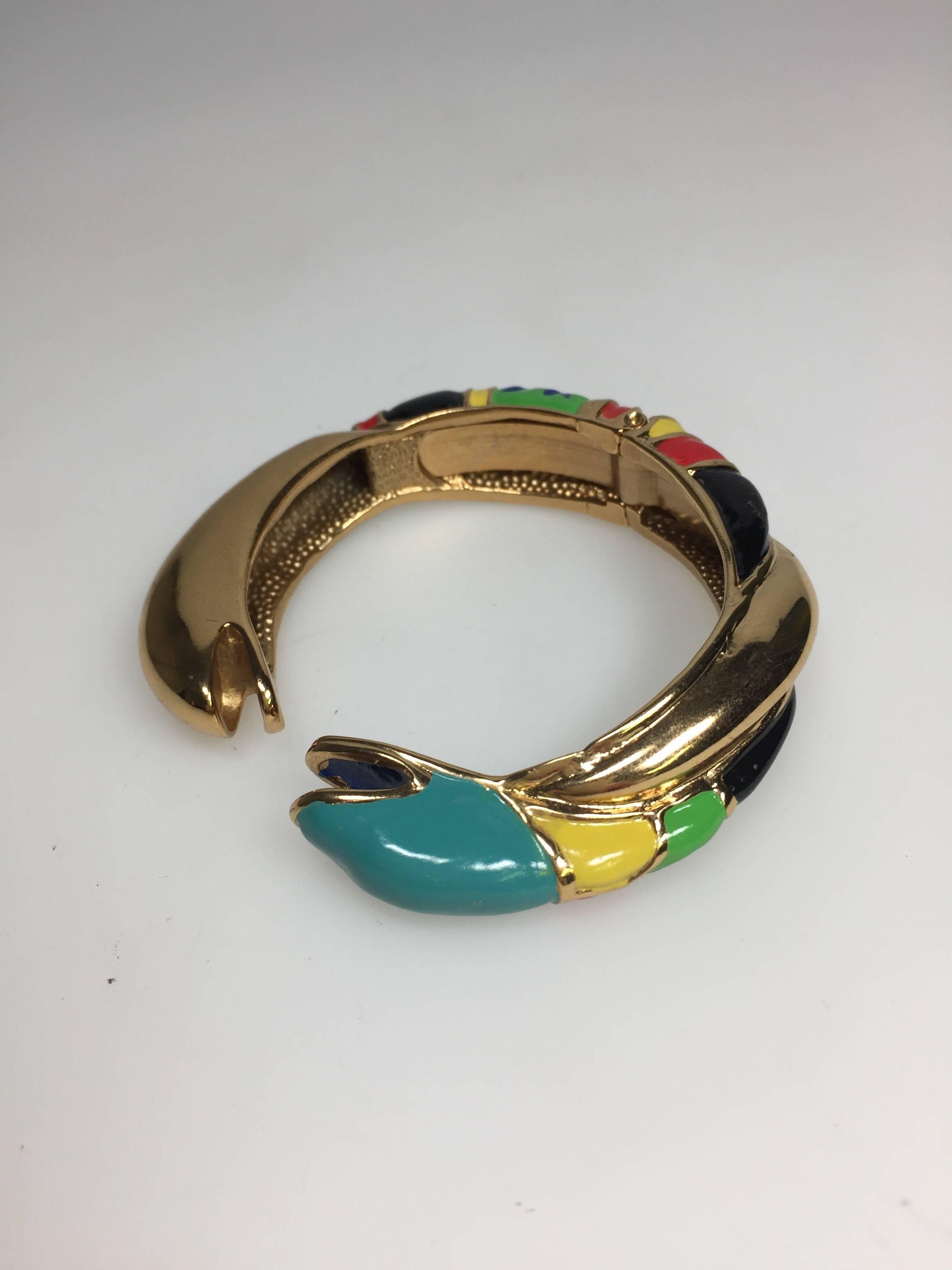 Gild and enamelled metal articulated bracelet designed by Niky de Saint Phalle ca 1980

Fits a medium wrist