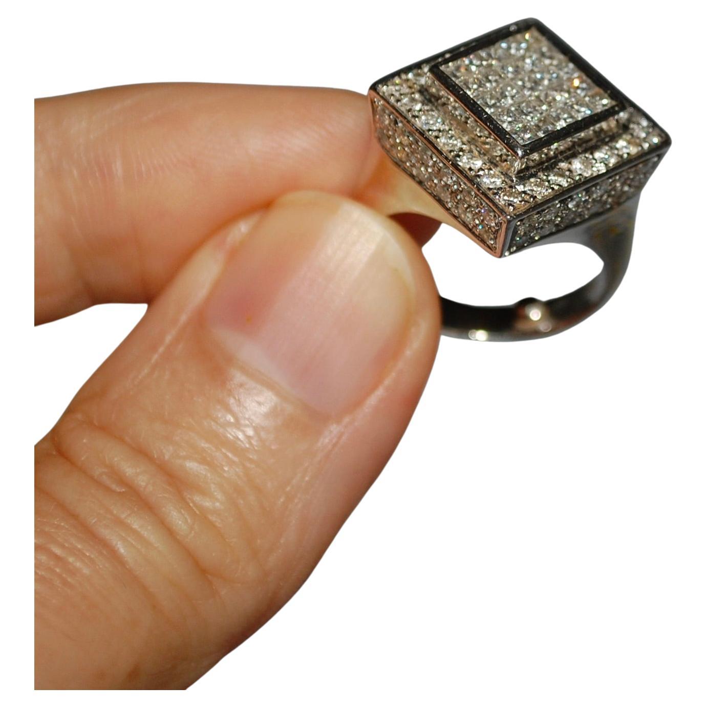 Vintage 18K Gold Pave Signet Diamond Ring
This 18k white gold pave diamond ring weighs approximately 10.6 grams and showcases very nice quality white sparking princes cut diamonds 0.88 ctw, each masterfully set in elevated polished gold frame,